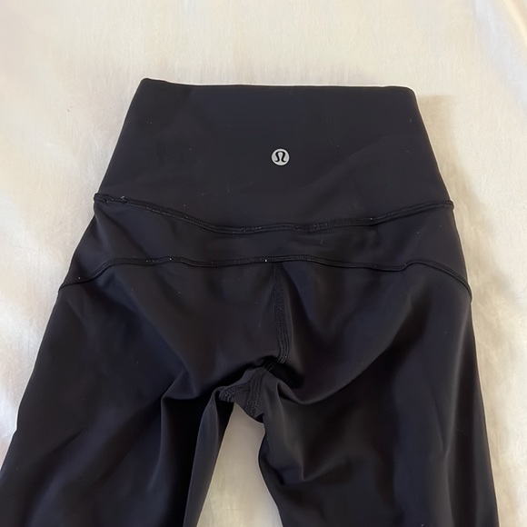 Black lululemon leggings with seems on the sides - Picture 4 of 4